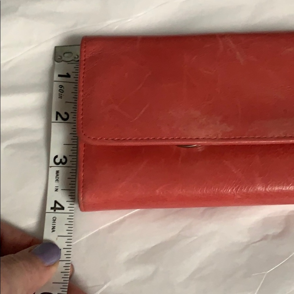 HOBO unique coral color wallet.